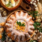 Easter yeast cake with icing and candied orange peel, top view.  Delicious Easter dessert, traditional Easter pastries in Poland